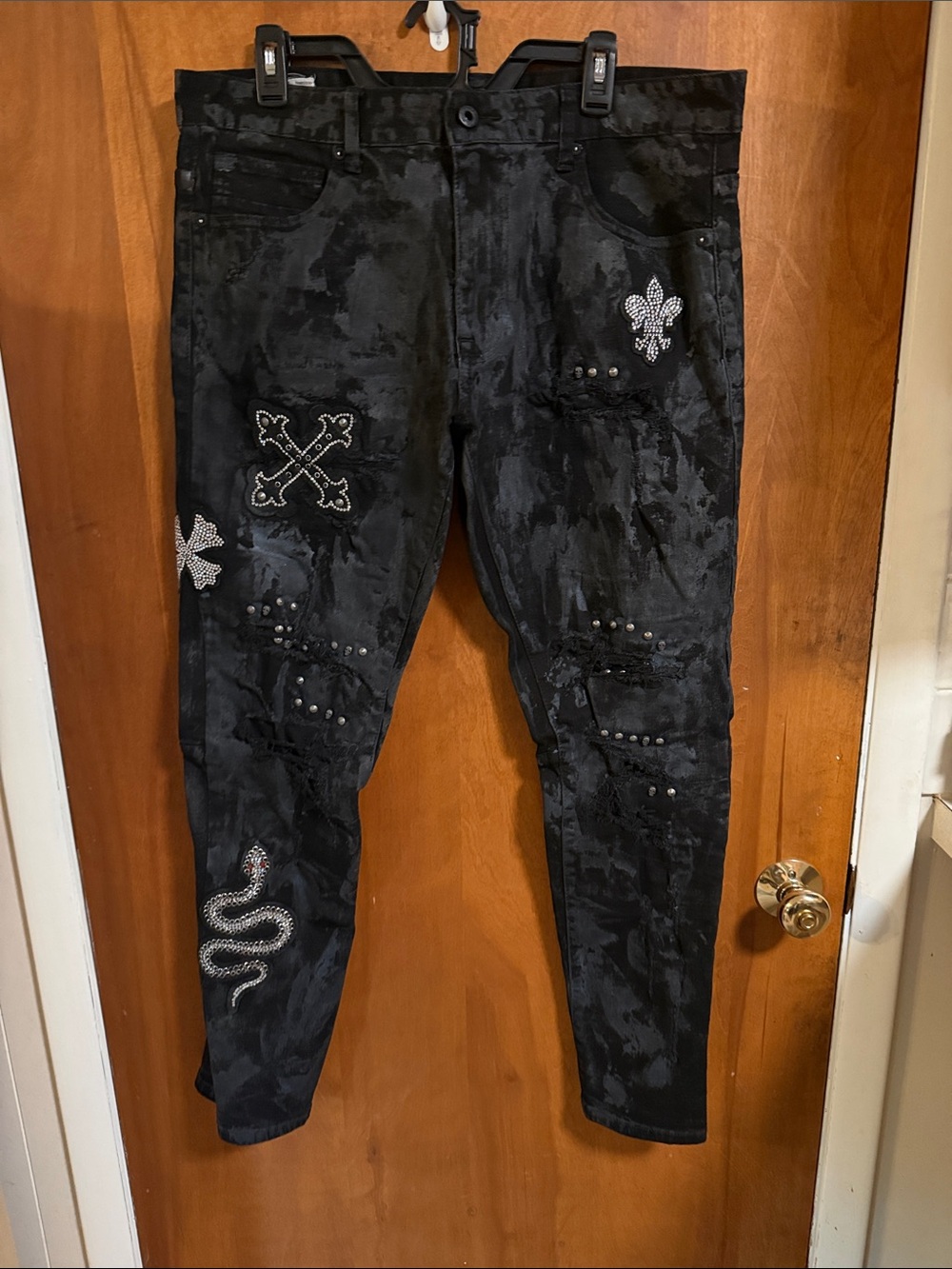Studded Black Distressed Jeans with Rhinestone Accents
